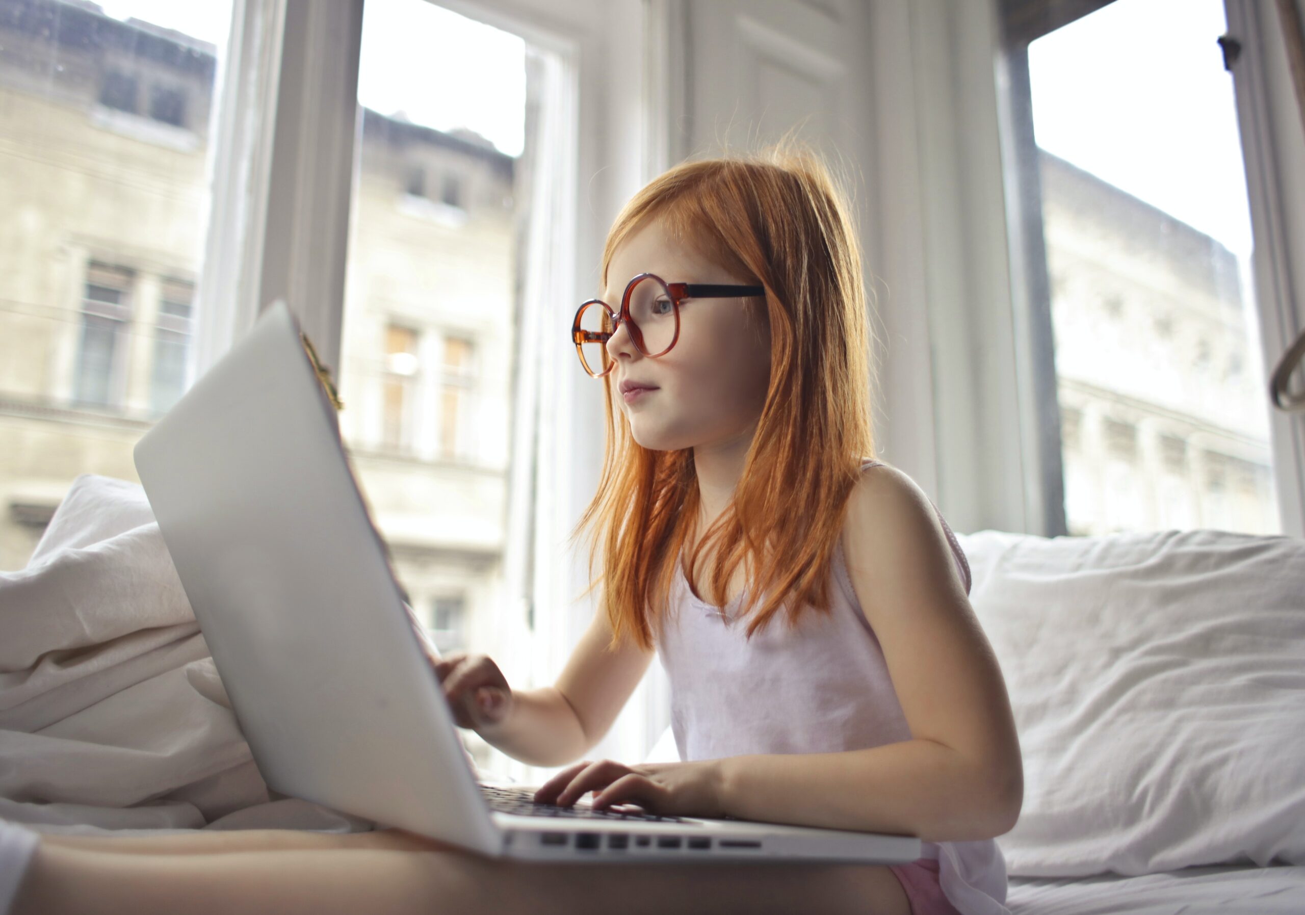 a-girl-watching-movie-on-computer-laptop-3761513